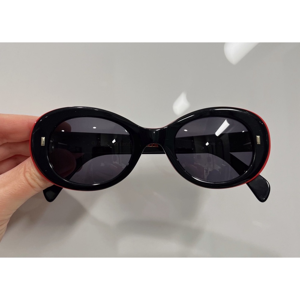 $500 Cutler and Gross chic classic oval sunglasses black red